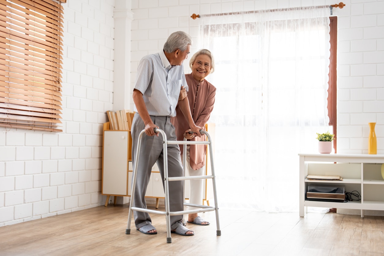 Senior man & woman walking