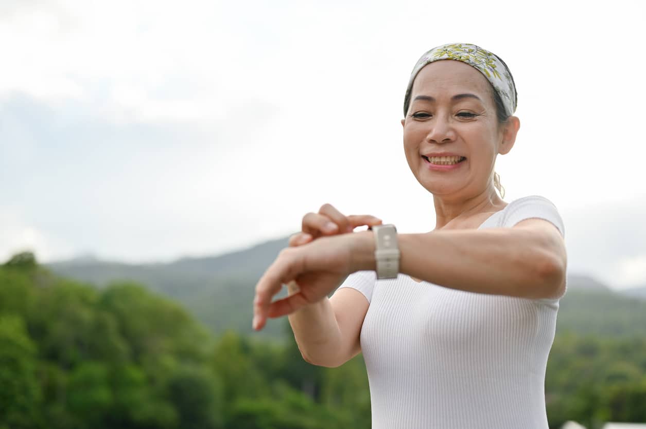 Senior woman using a smartwatch